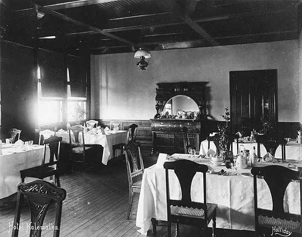 The hotel dining room set with white tablecloths